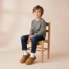 image:imageCUSHIONAIRE Keto Genuine Suede Leather Kids Slippers for Boys and Girls  Cozy SlipOn Mule House Shoes with Faux Fur Lining Cushioned Memory Foam ComfortChestnut