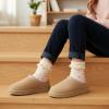 image:imageCUSHIONAIRE Keto Genuine Suede Leather Kids Slippers for Boys and Girls  Cozy SlipOn Mule House Shoes with Faux Fur Lining Cushioned Memory Foam ComfortSandpink
