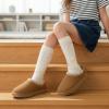 image:imageCUSHIONAIRE Keto Genuine Suede Leather Kids Slippers for Boys and Girls  Cozy SlipOn Mule House Shoes with Faux Fur Lining Cushioned Memory Foam ComfortChestnutnatural