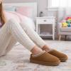 image:imageCUSHIONAIRE Keto Genuine Suede Leather Kids Slippers for Boys and Girls  Cozy SlipOn Mule House Shoes with Faux Fur Lining Cushioned Memory Foam ComfortChestnutnatural