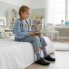 image:imageCUSHIONAIRE Kids Hana Cork footbed clog with Genuine Leather upper Faux Fur lining and ComfortBlack