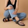 image:imageCUSHIONAIRE Leader Womens Strappy Sandal  Premium Faux Leather Toe Loop Flat with Adjustable Ankle Strap amp Cushioned FootbedBlack