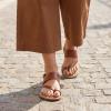 image:imageCUSHIONAIRE Leader Womens Strappy Sandal  Premium Faux Leather Toe Loop Flat with Adjustable Ankle Strap amp Cushioned FootbedCognac