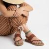 image:imageCUSHIONAIRE Leader Womens Strappy Sandal  Premium Faux Leather Toe Loop Flat with Adjustable Ankle Strap amp Cushioned FootbedCognac