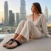 image:imageCUSHIONAIRE Leah Thong Womens Sandals  Cork Footbed Flip Flops for Women with Memory Foam and Adjustable Buckle StrapBlack