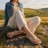 image:imageCUSHIONAIRE Cruise Lightweight Womens Flip Flops Comfortable Beach Sandals for Women with Cushioned Footbed amp Flexible Slip On DesignGold Smooth