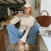 image:imageCUSHIONAIRE Lucia Raffia Bow Espadrille Sandals for Women Woven Straw Flat Slide Summer Sandals with Cushioned FootbedBeige