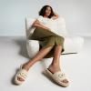 image:imageCUSHIONAIRE Lucia Raffia Bow Espadrille Sandals for Women Woven Straw Flat Slide Summer Sandals with Cushioned FootbedBeige