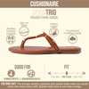 image:imageCUSHIONAIRE Trio Flip Flops for Women Comfortable Beach Sandals with Braided Thong Strap Memory Foam Footbed and Metallic Ring AccentsCognac