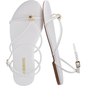 image:imageCUSHIONAIRE Tory Strappy Flat Sandals for Women Toe Ring Sandals with Adjustable Buckle Ankle Strap Wrap StyleIvory