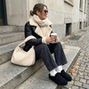 image:imageCUSHIONAIRE Casey Genuine Suede Moccasin Slippers for Women Cozy House Shoes with Moc Toe and Penny Loafer StrapBlack
