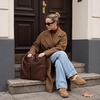 image:imageCUSHIONAIRE Casey Genuine Suede Moccasin Slippers for Women Cozy House Shoes with Moc Toe and Penny Loafer StrapCamel