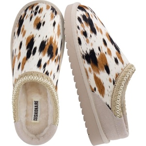image:imageCUSHIONAIRE Keto Genuine Suede Leather Kids Slippers for Boys and Girls  Cozy SlipOn Mule House Shoes with Faux Fur Lining Cushioned Memory Foam ComfortBrown Spotted