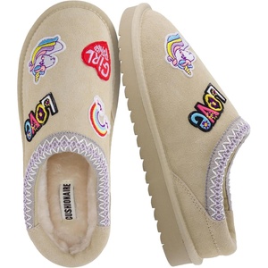 image:imageCUSHIONAIRE Keto Genuine Suede Leather Kids Slippers for Boys and Girls  Cozy SlipOn Mule House Shoes with Faux Fur Lining Cushioned Memory Foam ComfortSand
